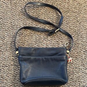 Elegant soft Leather Navy Blue Crossbody Bag With flip flop charm on zipper